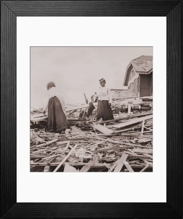 Framed Print : Two African American women on rubble trying to find where their Galveston home stood Framed Print : Two African American women on rubble trying to find where their Galveston home stood