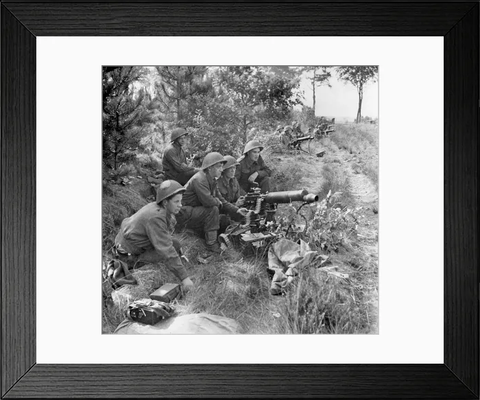 Framed Print : British troops at action stations ready to provide covering fire for the infantry crossing a canal. Sept. 17-25