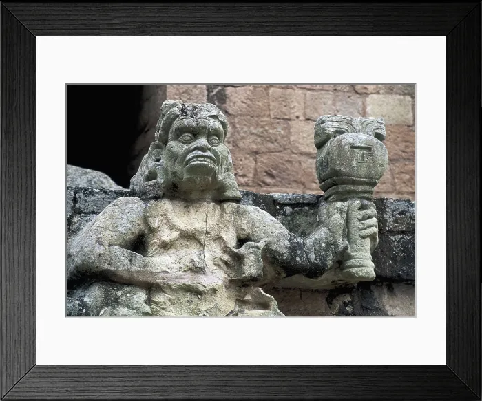 Framed Print : HONDURAS. Copn. Structure 11 in Western Square. Supernatural figure holding a torch. Maya art. Sculpture on rock. AISA / Everett Collection**US SALES ONLY**