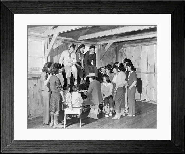 Framed Print : Japanese-American internees gathered around piano at Manzanar War Relocation Center Framed Print : Japanese-American internees gathered around piano at Manzanar War Relocation Center