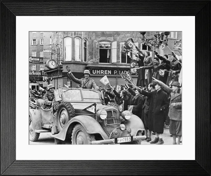 Framed Print : German soldier waving to the Viennese crowd during Hitler's triumphant entry into Vienna, Austria. March 15, 1938. (BSLOC_2015_13_30)