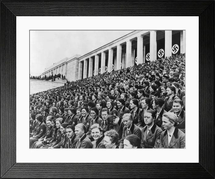 Framed Print : Uniformed young women with Nazi insignia in the Zeppelin Grandstand at Nuremberg. The stadium was on the Nazi Party Rally Grounds designed by Hitler's architect, Albert Speer