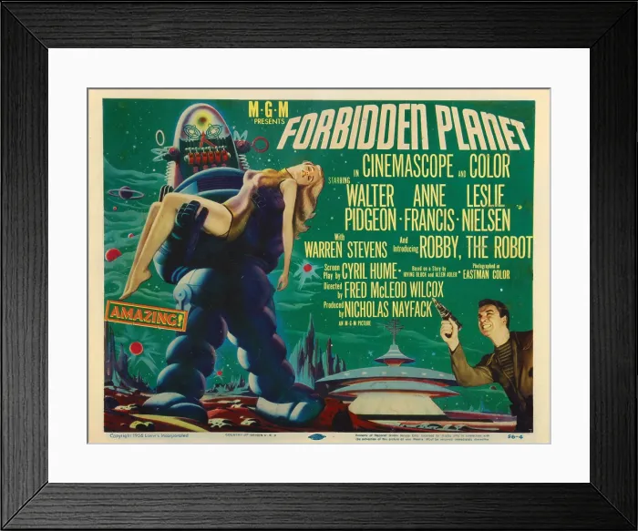 Framed Print : FORBIDDEN PLANET, left: Robby the Robot, lower right: Leslie Nielsen, 1956