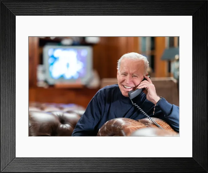 Framed Print : President Joe Biden on a phone call with military personnel attending Super Bowl LV watch parties in Kabul and aboard the USS Nimitz, Feb. 7, 2021 (BSLOC_2021_4_16)