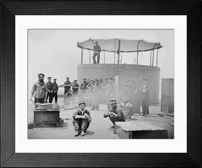 Framed Print : US Civil War. The USS Monitor, the Union ironclad gunboat after the Battle of Hampton Roads. Sailors gather on the deck of USS Monitor as a cook oversees pots on a stove