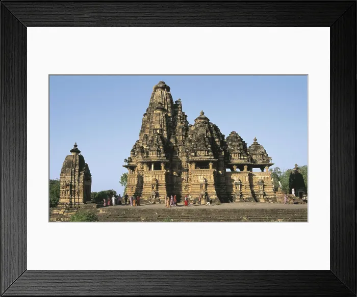Framed Print : INDIA. MADHYA PRADESH. Khajraho. Temple topped with shikharas, symbolizing the sacred mount of Meru. AISA / Everett Collection**US SALES ONLY** Framed Print : INDIA. MADHYA PRADESH. Khajraho. Temple topped with shikharas, symbolizing the sacred mount of Meru. AISA / Everett Collection**US SALES ONLY**
