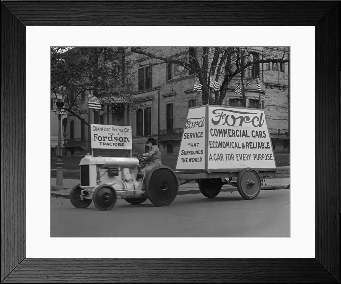 Framed Print : Fordson tractor pulls mobile Ford advertising in Washington, D.C. in 1922. Fordson tractors were reliable, low priced, and affordable for farmers (BSLOC_2016_10_112)