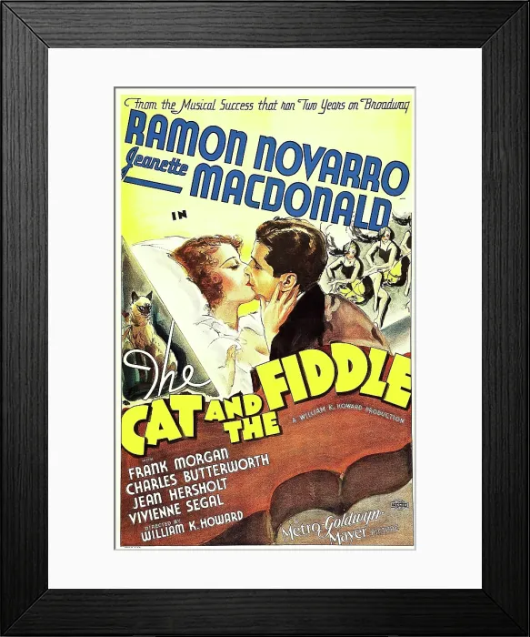 Framed Print : THE CAT AND THE FIDDLE, from left on US poster art: Jeanette MacDonald, Ramon Novarro, 1934