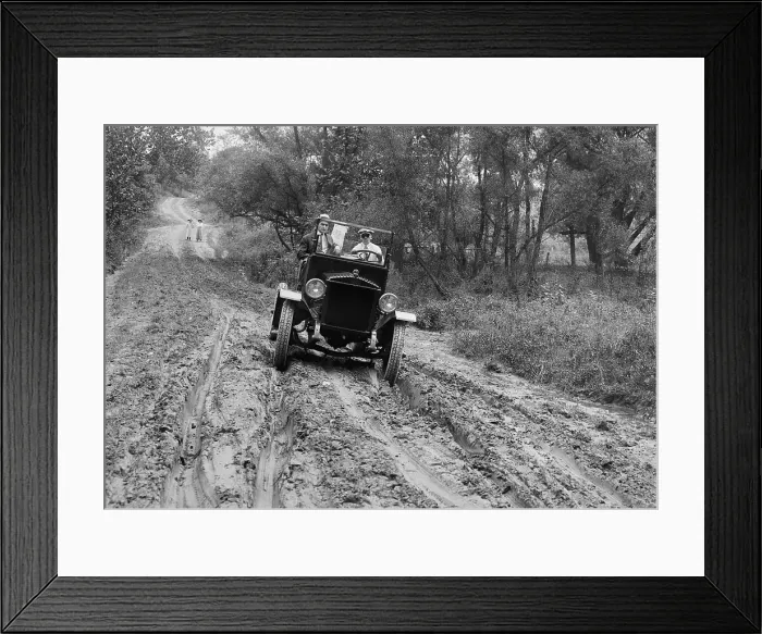 Framed Print : Duplex Truck with four wheel drive moves forward on a rutted, muddy road near Culpeper, Virginia, c. 1918-21 (BSLOC_2016_10_122)