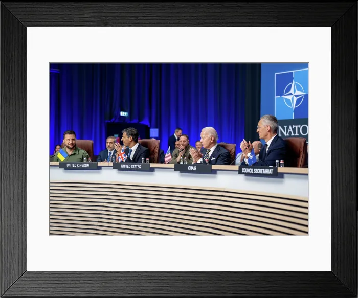Framed Print : NATO-Ukraine Council of the NATO Summit meets at the distant circular table in the large interior space, in Vilnius, Lithuania Framed Print : NATO-Ukraine Council of the NATO Summit meets at the distant circular table in the large interior space, in Vilnius, Lithuania