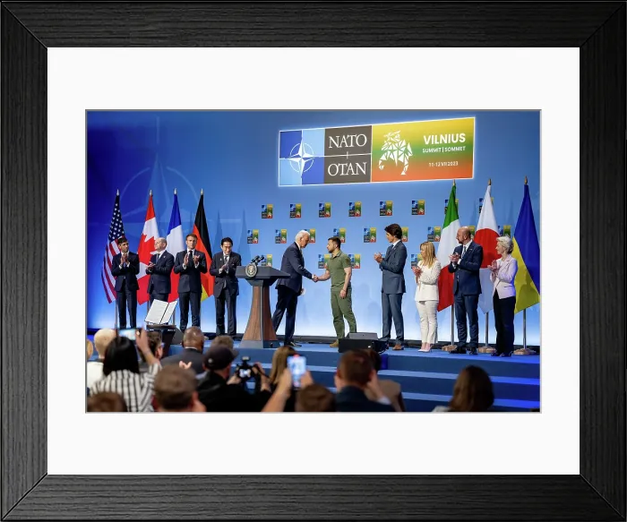 Framed Print : Ukrainian President Volodymyr Zelenskyy receives applause at a meeting of the NATO-Ukraine Council, July 12, 2023