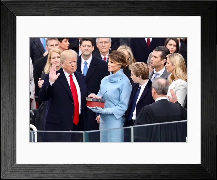 Framed Print : Donald Trump takes the oath of office to become the nation's 45th president, Jan. 20, 2017. His wife Melania holds the Lincoln Bible in the red box