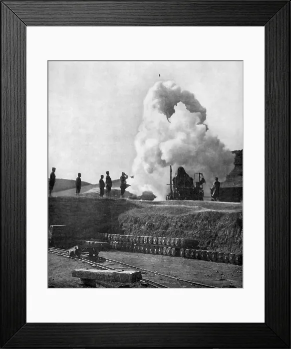 Framed Print : A Japanese 11 inch siege gun fires on Port Arthur during the Russo-Japanese war. The 500 pound shell can be seen in flight above the gun (BSLOC_2017_18_103) Framed Print : A Japanese 11 inch siege gun fires on Port Arthur during the Russo-Japanese war. The 500 pound shell can be seen in flight above the gun (BSLOC_2017_18_103)