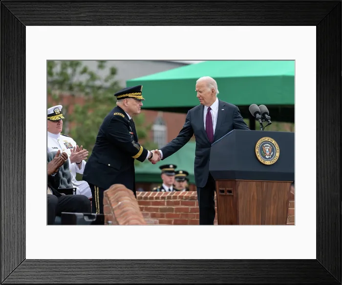 Framed Print : President Joe Biden shakes hands with retiring General Mark Milley before the Armed Forces Farewell