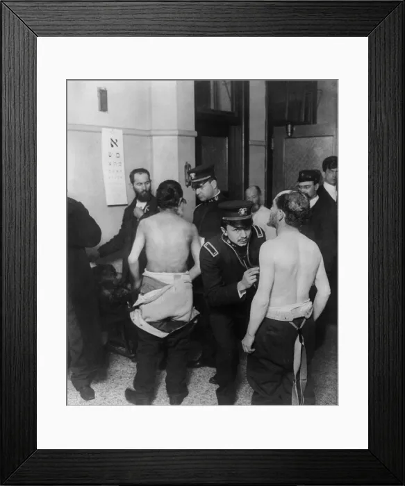 Framed Print : Public Health Service Physicians examining a group of Jewish immigrants at Ellis Island, c. 1907. An eye chart written in Hebrew hangs on wall (BSLOC_2018_1_20) Framed Print : Public Health Service Physicians examining a group of Jewish immigrants at Ellis Island, c. 1907. An eye chart written in Hebrew hangs on wall (BSLOC_2018_1_20)