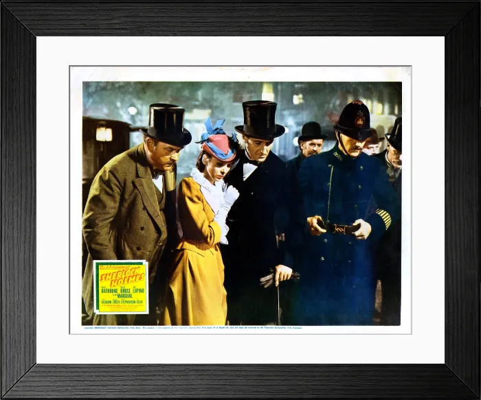 Framed Print : THE ADVENTURES OF SHERLOCK HOLMES, US lobbycard, Nigel Bruce (left), Ida Lupino (yellow dress), Basil Rathbone (tuxedo), 1939, TM and copyright 20th Century Fox Film Corp