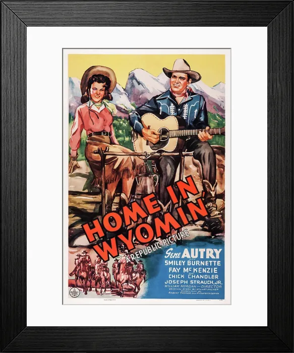 Framed Print : HOME IN WYOMIN, l-r: Fay McKenzie, Gene Autry on poster art, 1942