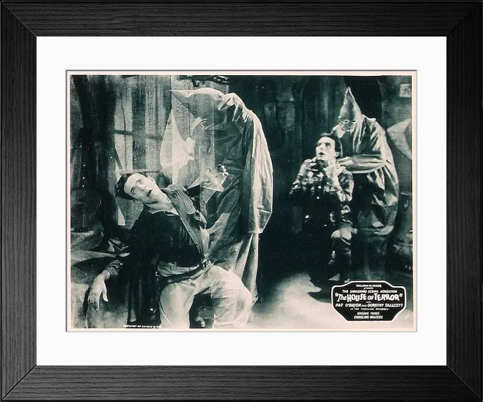 Framed Print : THE HOUSE OF TERROR, front left: Jack La Rue, scene card from a lobbycard set to this serial, 1928