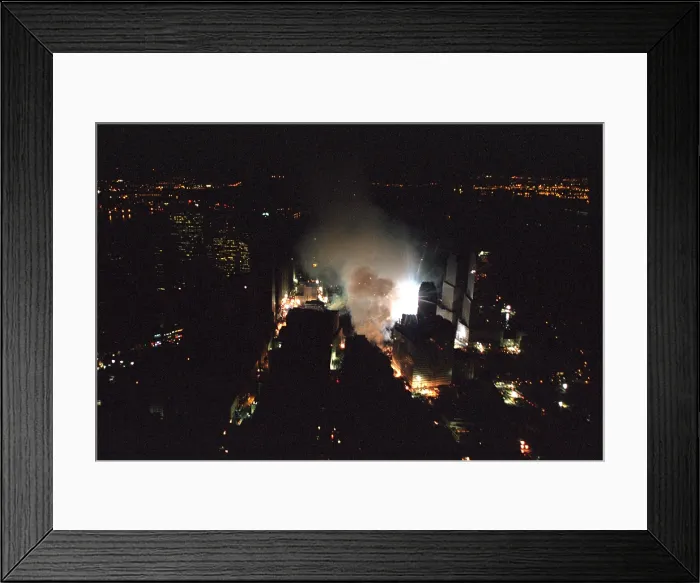Framed Print : The World Trade Center rescue site in New York City is seen the evening of Friday, Sept. 14, 2001. Photo was taken from President George W. Bush's helicopter, Marine One