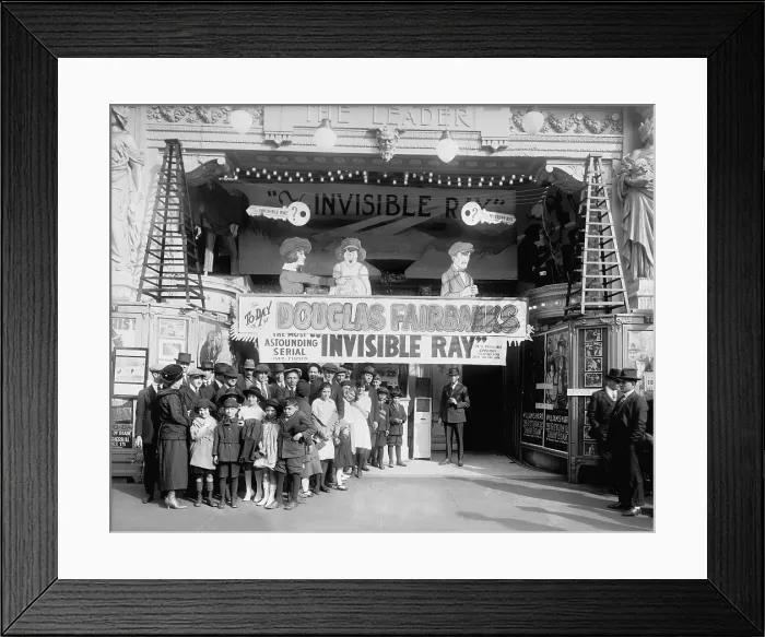 Framed Print : Ticket holders wait in front of The Leader movie theater in Washington, D.C. 1921. The day's feature was THE RETURN OF DRAW EGAN starring William S. Hart Framed Print : Ticket holders wait in front of The Leader movie theater in Washington, D.C. 1921. The day's feature was THE RETURN OF DRAW EGAN starring William S. Hart