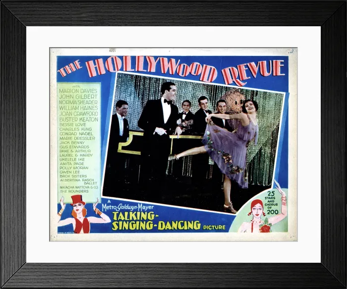 Framed Print : THE HOLLYWOOD REVUE OF 1929, Joan Crawford, being serenaded by pianist Dave Snell, and The Biltmore Quartet (Eddie Bush, Paul Gibbons, Ches Kirkpatrick, Bill Seckler), 1929