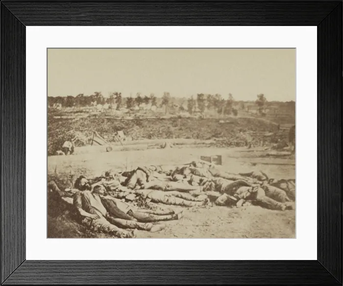 Framed Print : US Civil War, 2nd Battle of Corinth, Mississippi, Oct. 3-4, 1862. Confederate dead lay gathered at the bottom of the parapet of Battery Robinett on Oct. 5th. Confederate Col
