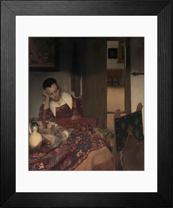 Framed Print : A MAID ASLEEP, by Johannes Vermeer, 1656-57, Dutch painting, oil on canvas. A young woman is asleep at a table with two wine glasses, a jug, and a bowl of fruit
