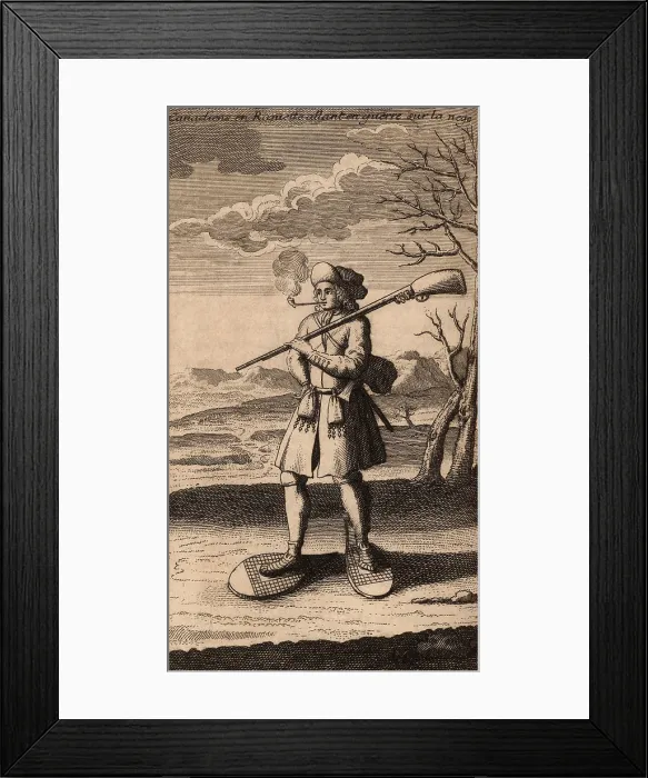 Framed Print : French Canadian soldier in war dress walks on snowshoes during the winter