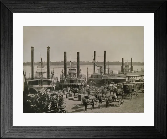 Framed Print : Four steamboats docked at the St. Louis Levee in 1853. Horses, wagons, and carriages park on the wharf among the crates and barrels. Daguerreotype by Thomas M