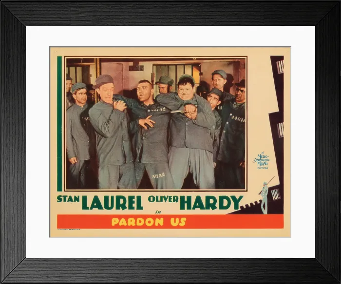 Framed Print : PARDON US, lobbycard, front, from left: Stan Laurel, Walter Long, Oliver Hardy, 1931