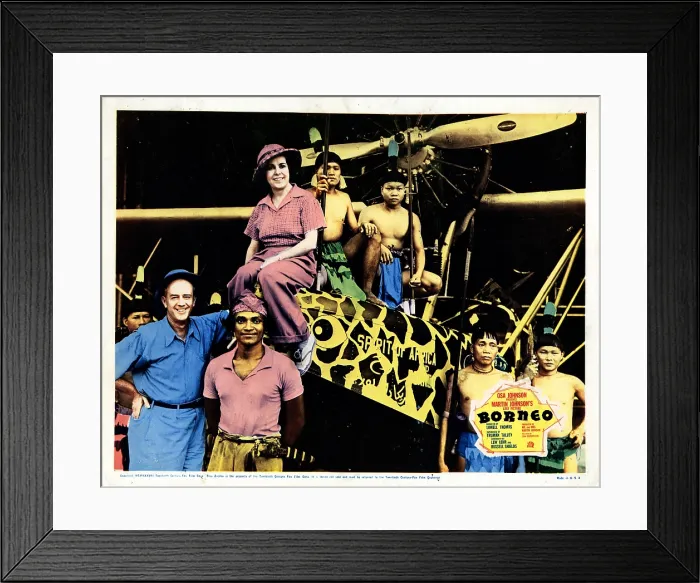 Framed Print : BORNEO, from left, Martin Johnson, Osa Johnson, 1937, TM and copyright 20th Century Fox Film Corp. All rights reserved / Courtesy: Everett Collection Framed Print : BORNEO, from left, Martin Johnson, Osa Johnson, 1937, TM and copyright 20th Century Fox Film Corp. All rights reserved / Courtesy: Everett Collection