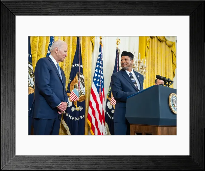Framed Print : President Joe Biden looks on as Dr. Talib M. Shareef, Imam of Masjid Muhammad, speaks at the Eid reception at the White House, May 2, 2022