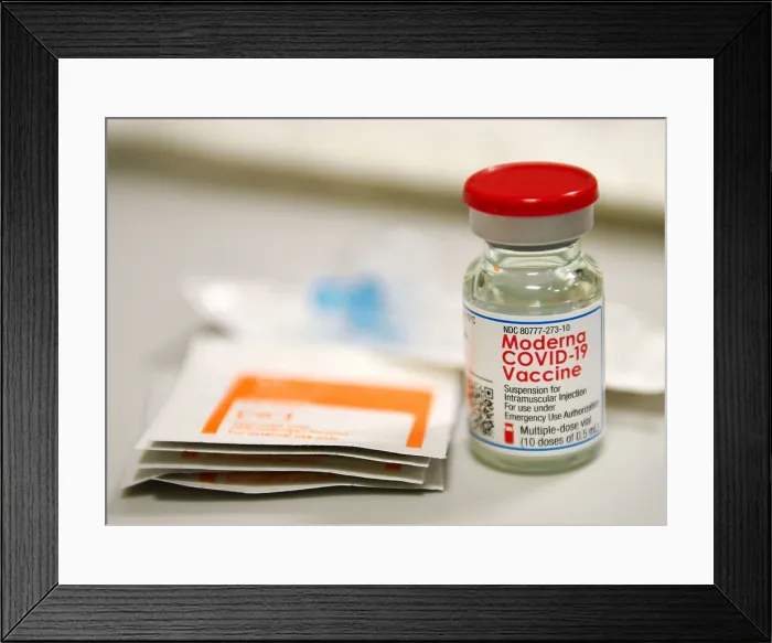 Framed Print : Moderna Covid-19 vaccine vial. The vaccine was authorized for emergency use by the US Food and Drug Administration on Dec. 18, 2020 (BSLOC_2021_1_21) Framed Print : Moderna Covid-19 vaccine vial. The vaccine was authorized for emergency use by the US Food and Drug Administration on Dec. 18, 2020 (BSLOC_2021_1_21)