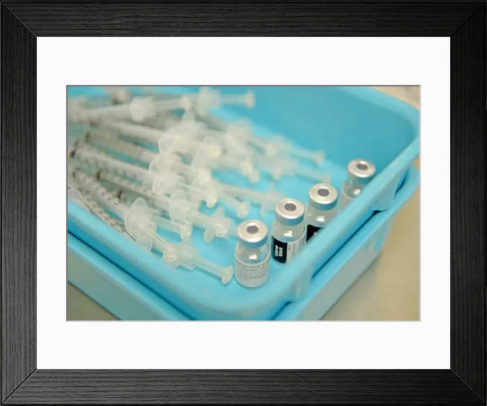 Framed Print : Syringes to be used for COVID-19 vaccinations sit in a tray at a US Veterans Medical Center in Bay Pines, Florida, Dec. 28, 2020 (BSLOC_2021_1_22) Framed Print : Syringes to be used for COVID-19 vaccinations sit in a tray at a US Veterans Medical Center in Bay Pines, Florida, Dec. 28, 2020 (BSLOC_2021_1_22)