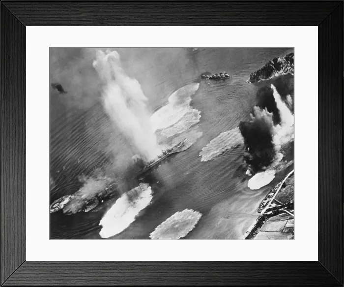Framed Print : U.S. carrier planes bomb Japanese cruisers anchored in the Kure Harbor Naval Base at Honshu