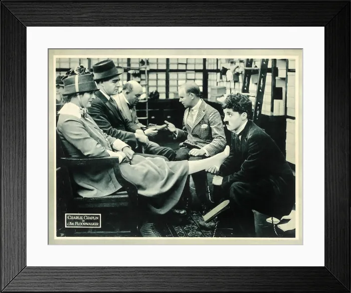 Framed Print : THE FLOORWALKER, right: Charlie Chaplin on lobbycard, 1916 Framed Print : THE FLOORWALKER, right: Charlie Chaplin on lobbycard, 1916