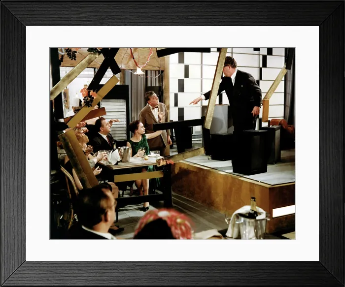 Framed Print : PLAYTIME, Barbara Dennek (raised hand), Jacques Tati (bowtie), 1967 Framed Print : PLAYTIME, Barbara Dennek (raised hand), Jacques Tati (bowtie), 1967