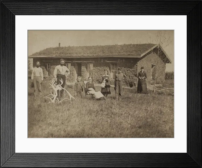 Framed Print : Morrison family residence on Victoria Creek near Merna, Custer County, Nebraska, 1886. Four adults and three children pose in front of their sod house. Photo by Solomon D