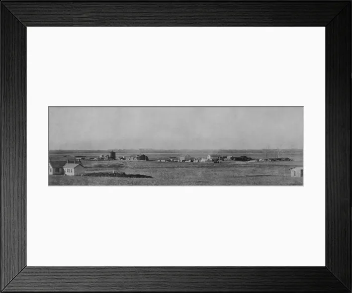 Framed Print : US Army photo of the beginnings of Oklahoma City, 1889. There are government dwellings, stables, a water tank, railroad station, hotel, post office and store
