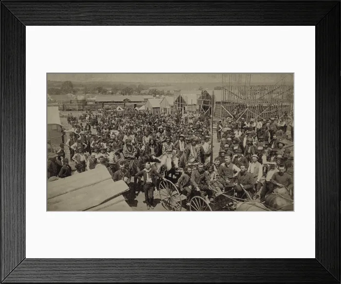 Framed Print : Crowd of men, most looking toward the photographer, in Guthrie, Oklahoma, four weeks after the 1889 Land Rush'. It includes Native Americans is distinctive clothing Framed Print : Crowd of men, most looking toward the photographer, in Guthrie, Oklahoma, four weeks after the 1889 Land Rush'. It includes Native Americans is distinctive clothing
