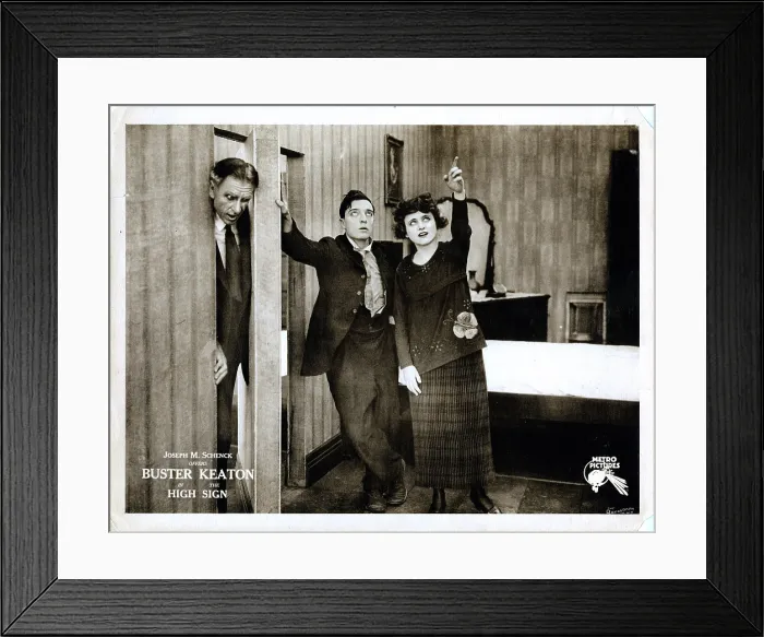Framed Print : THE HIGH SIGN, lobbycard, Buster Keaton (center), Bartine Burkett (right), 1921