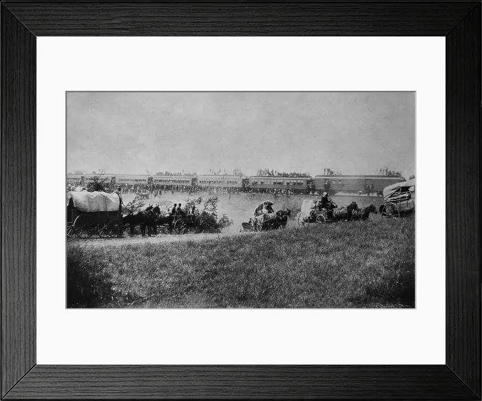 Framed Print : Homesteaders taking the first train into the Cherokee Outlet during the Land Run of Sept. 16, 1893. The train and its ten cars filled with homesteaders, was bound for Perry Framed Print : Homesteaders taking the first train into the Cherokee Outlet during the Land Run of Sept. 16, 1893. The train and its ten cars filled with homesteaders, was bound for Perry