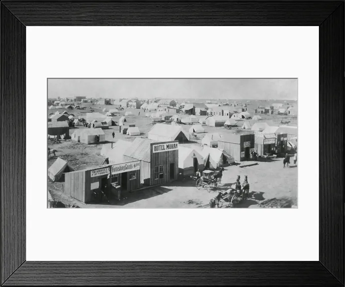 Framed Print : A section of Guthrie, Oklahoma with a combination of wood buildings and tents, at the time of the 1893 Land Rush