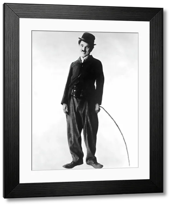 Framed Print : THE TRAMP, (aka CHARLIE ON THE FARM; CHARLIE THE HOBO; CHARLIE THE TRAMP), Charlie Chaplin, (aka, Charles Chaplin), 1915