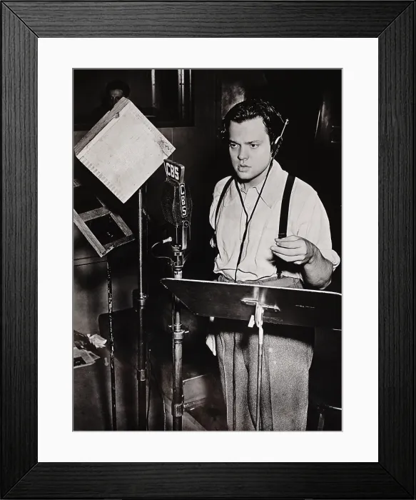 Framed Print : Orson Welles performs on the CBS Radio in 1938. FIRST PERSON SINGULAR, presented hour long dramatic adaptions from popular literary works from July-Sept