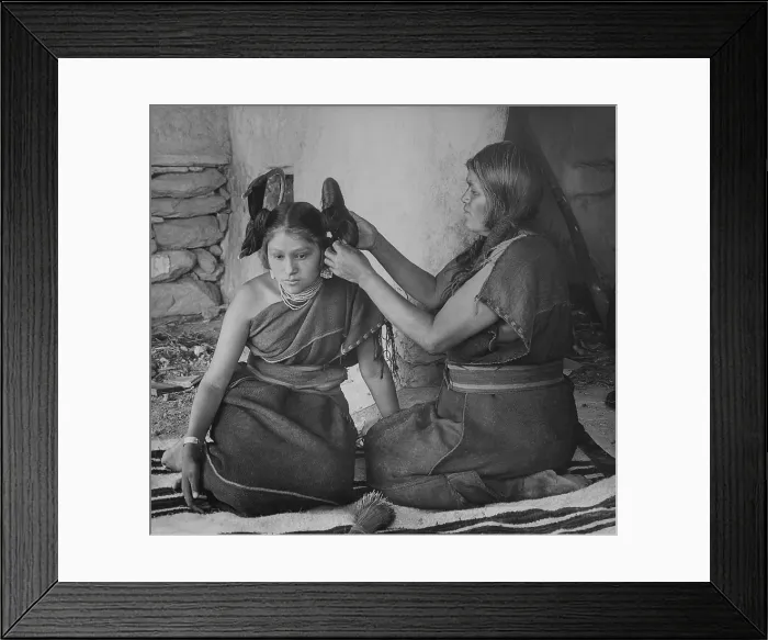 Framed Print : A Hopi woman dresses the hair of young unmarried women, ca. 1900, by Henry Peabody