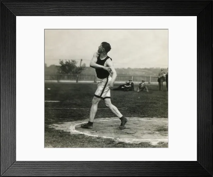 Framed Print : Jim Thorpe throwing discus, one event of the Olympic pentathlon. In 1912 he won the Olympic Gold Medal in the event