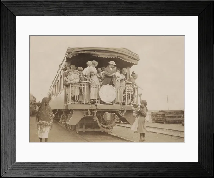 Framed Print : Acoma Indians sell their wares to Euro-American tourists on a train in New Mexico, 1912. Photo by Hugh Mear Neighbor (BSLOC_2019_9_83)