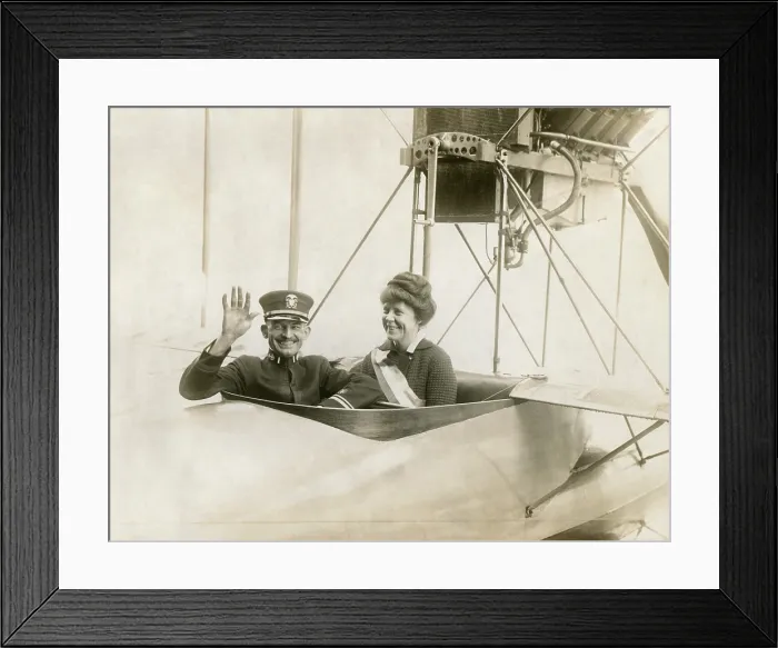 Framed Print : Lucy Burns, National Vice-Chairman of the Congressional Union for Woman Suffrage. She is in an aeroplane with Lt