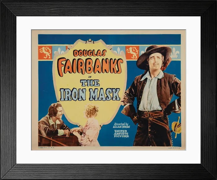 Framed Print : THE IRON MASK, titlecard, Douglas Fairbanks, Sr. (left and right), Marguerite De La Motte (center), 1929